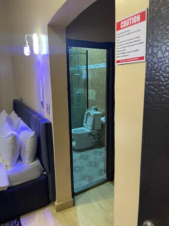 DE ROSS HOTEL & SUITES Отели рядом с достопримечательностью «Unity Park»