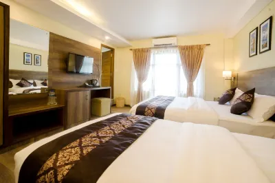 โรงแรม ธาคาลี อินน์ โรงแรมใน