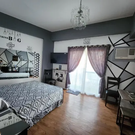 Condo Azur Suites Amani A125, near Airport, Netflix, Cozy with Luxurious Pool and Gym