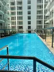 Luxury Condo near NAIA Airport & MOA with free Pool & Gym - ที่มีสระว่ายน้ำ