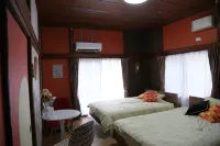 Golden Peach House - พร้อมอาหารเช้า