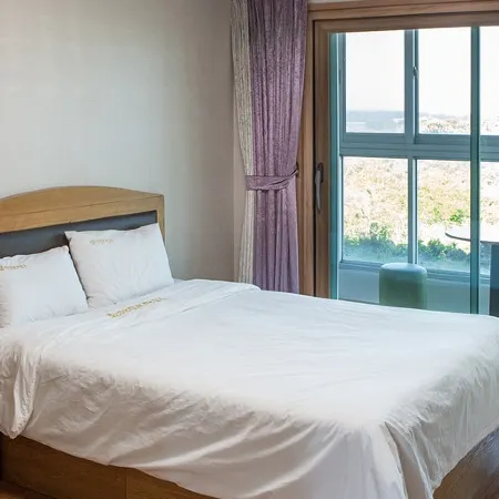 Jeju Amore House Отели рядом с достопримечательностью «Пляж Сехва»