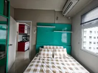 Cozy 2BR Pramuka Apt Tower Penelope Pool&Wi-Fi