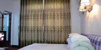 Shuiyin Inn - Dreibettzimmer