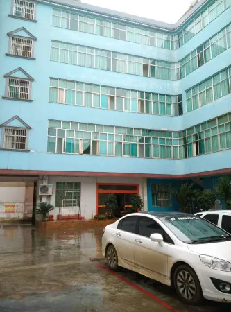 Shizong California Inn Отели в г. Шицзун