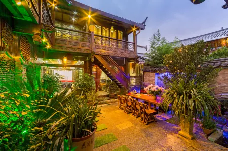 Anbian Yuxuange Boutique Inn (Lijiang Yuxuan) Отели в г. Лицзян