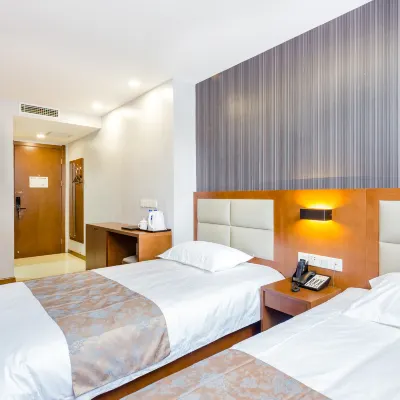 KUAI LE YI JIA HOTEL Hotels near محطة دينجشيكو
