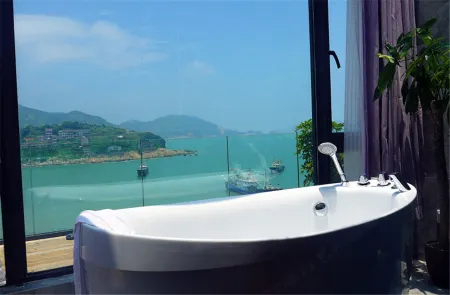 Between sky and sea Отели рядом с достопримечательностью «Wenling Shitang Peninsula Tourist Resort»