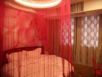 南丰爱琴海主题宾馆 - 浪漫情侣圆床房