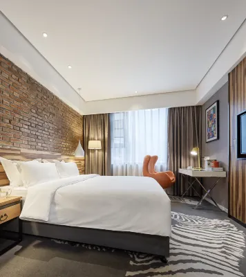 Orange Boutique Hotel Xinyang Hotel in zona Shihe Park