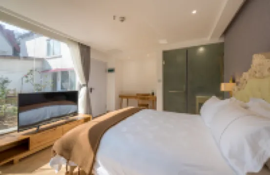 Jingli Villa Hotel (Qingdao Badaguan Scenic Area Linhuaiguan Road Branch)