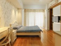 开心公寓(上海周浦万达店) - 精致温馨一室大床房