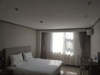 汉庭酒店(烟台开发区长江路店) - 高级特大床房