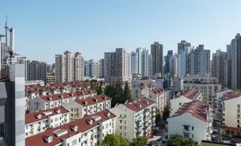Orange Hotel (Shanghai Jing'an Temple Wuning Road Subway Station Hotel)
