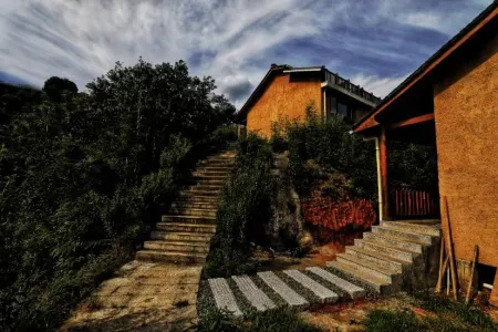 Niuwuling Guesthouse Отели в г. Юньхэ