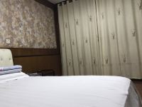 烟台浪漫之旅公寓(2号店) - 精致温馨大床房