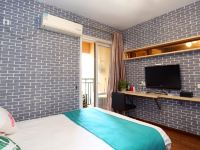 重庆西西的公寓(龙石路分店) - 蓝色一室大床房