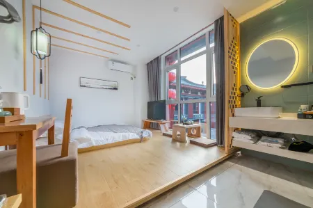 WUYUE HAPPY LANE HOSTEL Отели рядом с достопримечательностью «Big Wild Goose Pagoda»