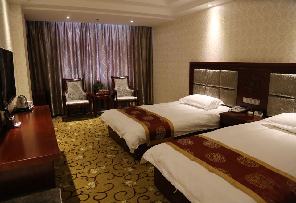 Q+ Shandan Renhe Hotel - Housity