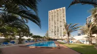 Chateau Beachside Resort Отели рядом с достопримечательностью «Смотровая площадка Скайпойнт»