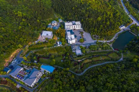 Ever-Joy Muxin Xiangcun Hotel Отели в г. Исин