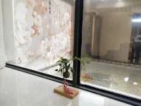 渠縣花園商務賓館（賨人裡財富中心店） - 停車場