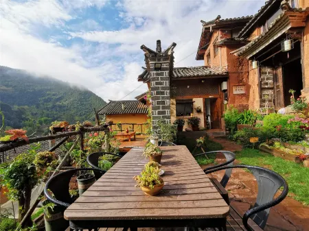 Nuodeng Nuoyan Bieyuan Garden Hotel Отели в г. Юньлун