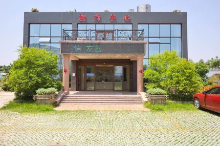 Longshanwan Guoleyuan Resort Отели рядом с достопримечательностью «Rizhao Coastal National Forest Park»