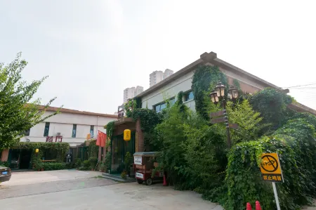 Old Tree Inn Отели рядом с достопримечательностью «Minghe Courtyard»