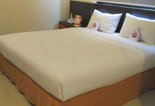 Nida Rooms Spbu Sunggal at Z Suites Hotel - Housity