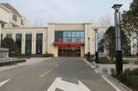 Queshan Guesthouse Hotel dekat Bandara Xinyang Minggang