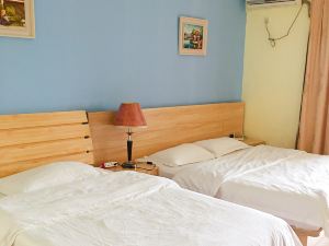 Yimi Yangguang Apartment Hotel (Nanning Guangxi University)