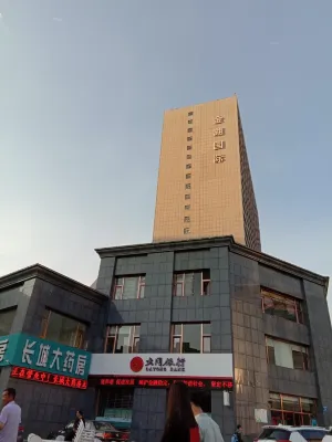 Jiuyuan Apartment Hotel a Xuanchen Plaza/Datong Railway Station