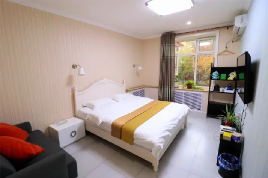 Huayi Hostel Отели рядом с достопримечательностью «Taiyangdao Wharf»