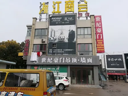 Yigang Hostel Отели в г. Баоин