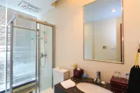 Dongfang Jinzuo Apartment Hotel - Condos
