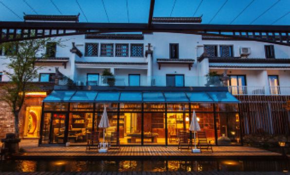 Grand Travel Lodge DESIGN Boutique Hotel(Xixi Nangu Village)