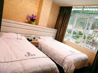 Jiulongminghua Business Hotel Hotels in Jiulong