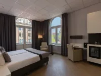 Hotel Amsterdam de Roode Leeuw Hoteles cerca de Plaza Dam