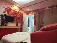 广州喜橙主题公寓 - 情侣浪漫圆床房
