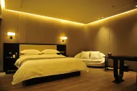 Yimao Business Hotel - Parkplatz