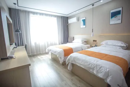 Tangerine Boutique Hotel Отели рядом с достопримечательностью «Dabie Mountain Azalea Ecological Cultural Grand View Garden»