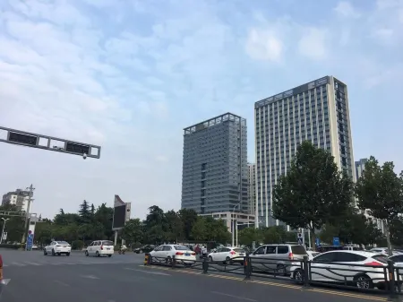 Lijiang Hotel (Xinyi Railway Station) Отели рядом со станцией Xinyi Railway Station