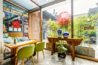 Floral Hotel· Xinglongyi Hotel(Pingyao Ancient City Scenic Area Store) - خدمة نقل من وإلى المطار