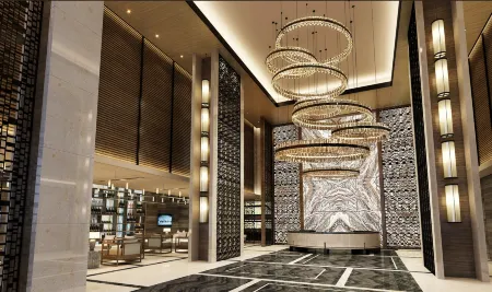 Hualiang Huatian Holiday Hotel Отели рядом с достопримечательностью «Hunan Biological and Electromechanical Polytechnic (Donghu Campus)»