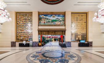 a large , ornate room with a mural on the wall and a circular marble floor at Paradise Hotel