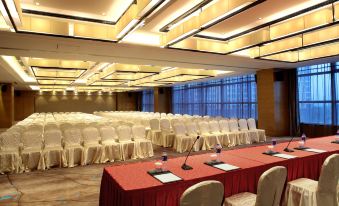 A spacious room at the hotel or conference venue is arranged with rows of chairs for an event at Grand Square Hotel Wuhu