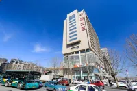 Dalian Yihe Zhixing Holiday Apartment - مطابخ
