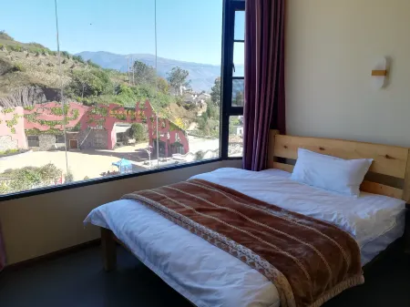 Kunming Qianhe Hotel Отели рядом с достопримечательностью «Dongchuan Red Land»