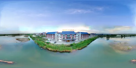 Northwest Folklore Inn (Zhangye National Wetland Park Branch) Отели рядом с достопримечательностью «Xilaisi»